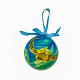 Australian Christmas bauble with a green sea turtle swimming in blue and green Great Barrier Reef waters, blue ribbon.