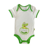 White short sleeve baby onesie with green trim around the collar, sleeves and legs with a Port Douglas Crocodile text and crocodile sitting in a pocket design.