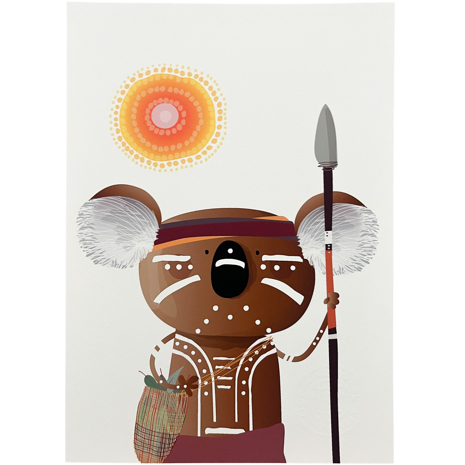 A4 art print of a koala with Aboriginal face and body paint, carrying a spear, dilly bag, with a sun and a Aboriginal design on a light cream background