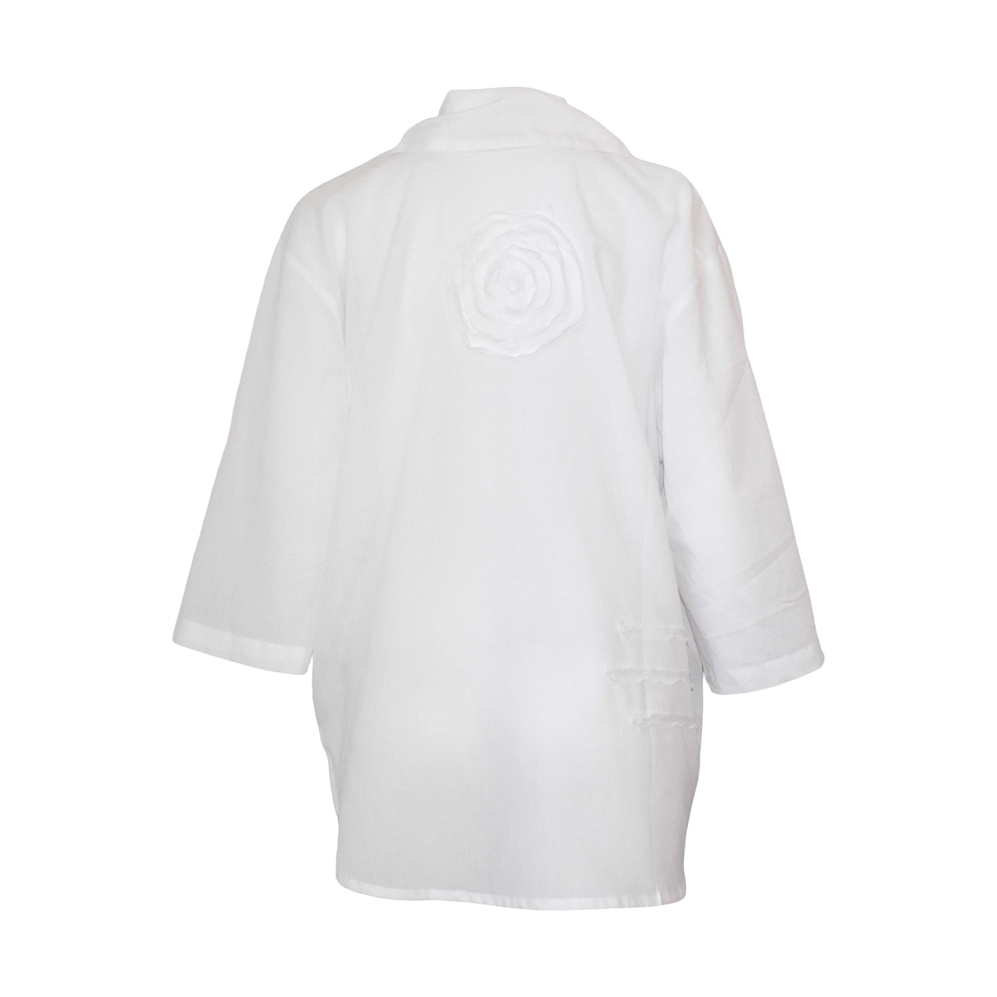 White button down shirt with a circular design on the back against a white background