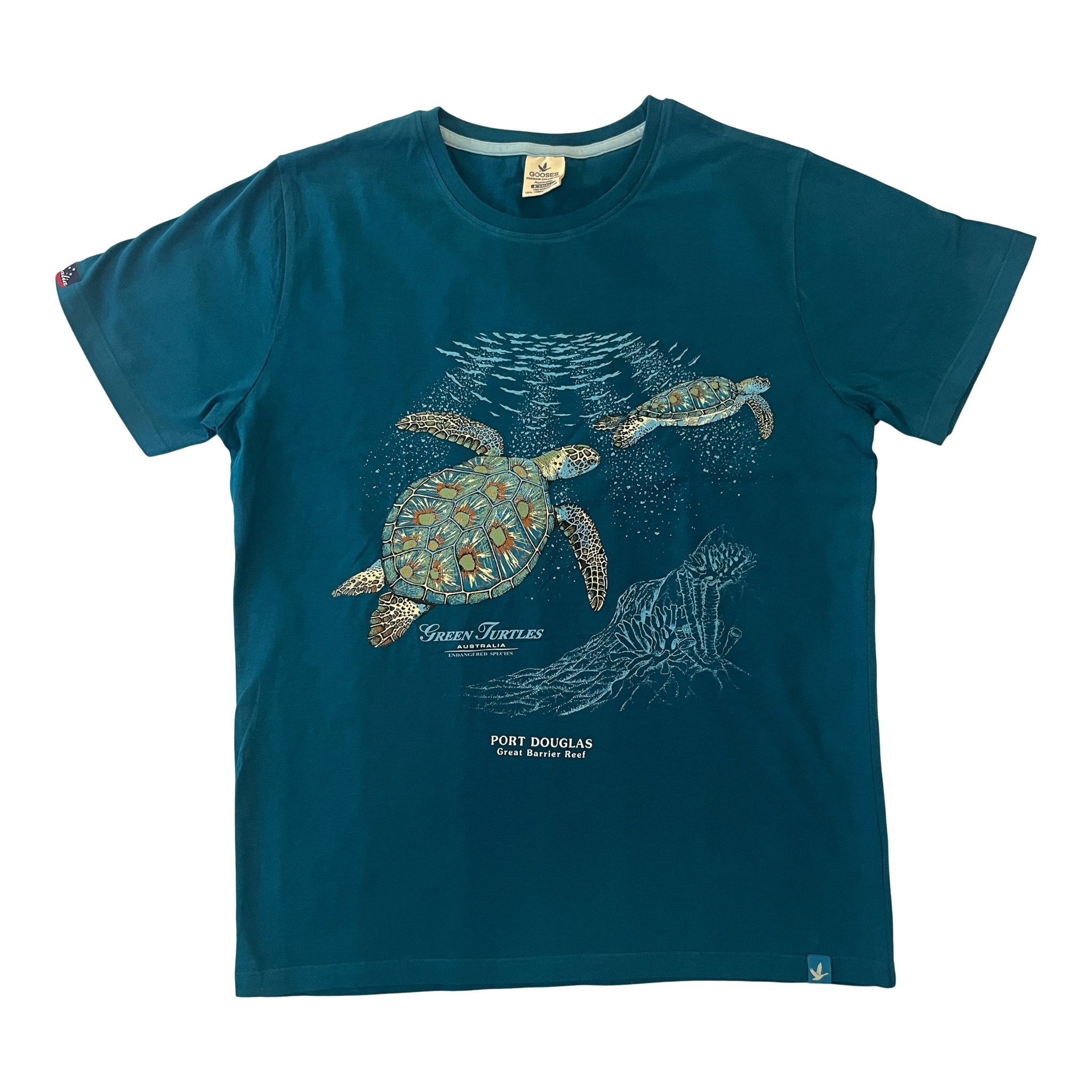 Teal men's 100% cotton t-shirt featuring two swimming sea turtles and "Port Douglas Great Barrier Reef" graphic.