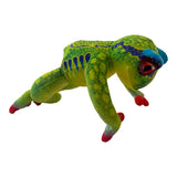 Vibrant green velour tree frog plush toy with yellow spots, blue markings, red toes, and large red eyes.