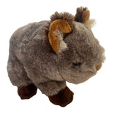 Plush Walter the Wombat soft toy, grey-brown with tan ears and dark brown feet.