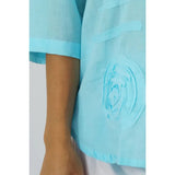 Women Wearing Aqua Lilly Button Down Shirt - Close Up of  Bottom Left Spiral Detail