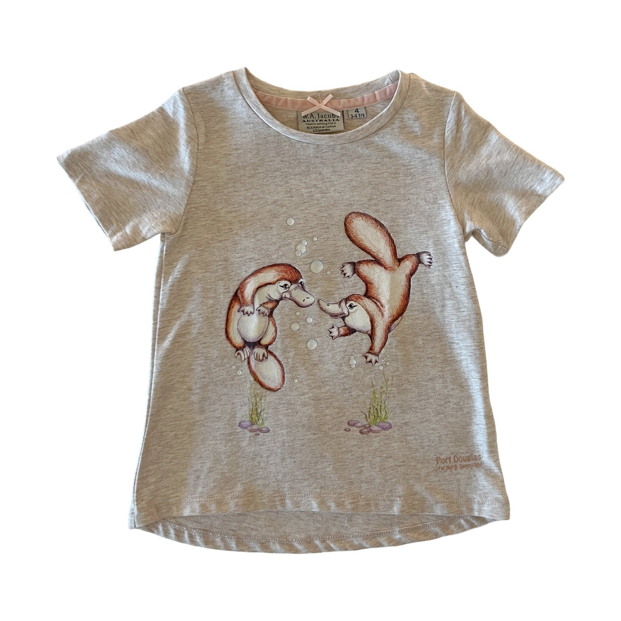 Girls oatmeal coloured t-shirt with a graphic of two platypus blowing bubbles on a white background
